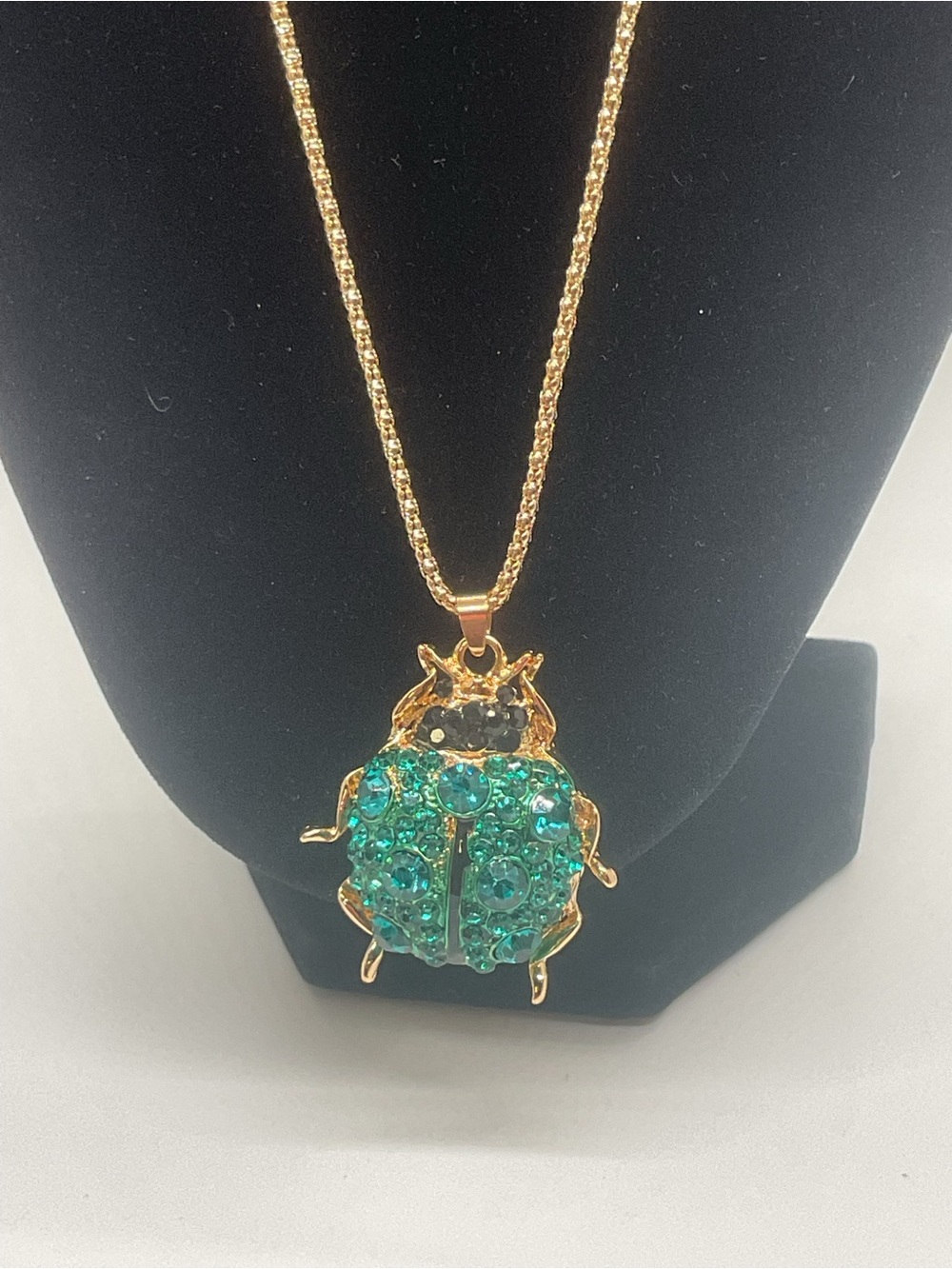 Betsey Johnson Gold-Tone Beetle Pendant Necklace with Teal-Green Crystals - Picture 2 of 6